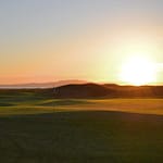 Sunset over the 18th green at The Machrie
