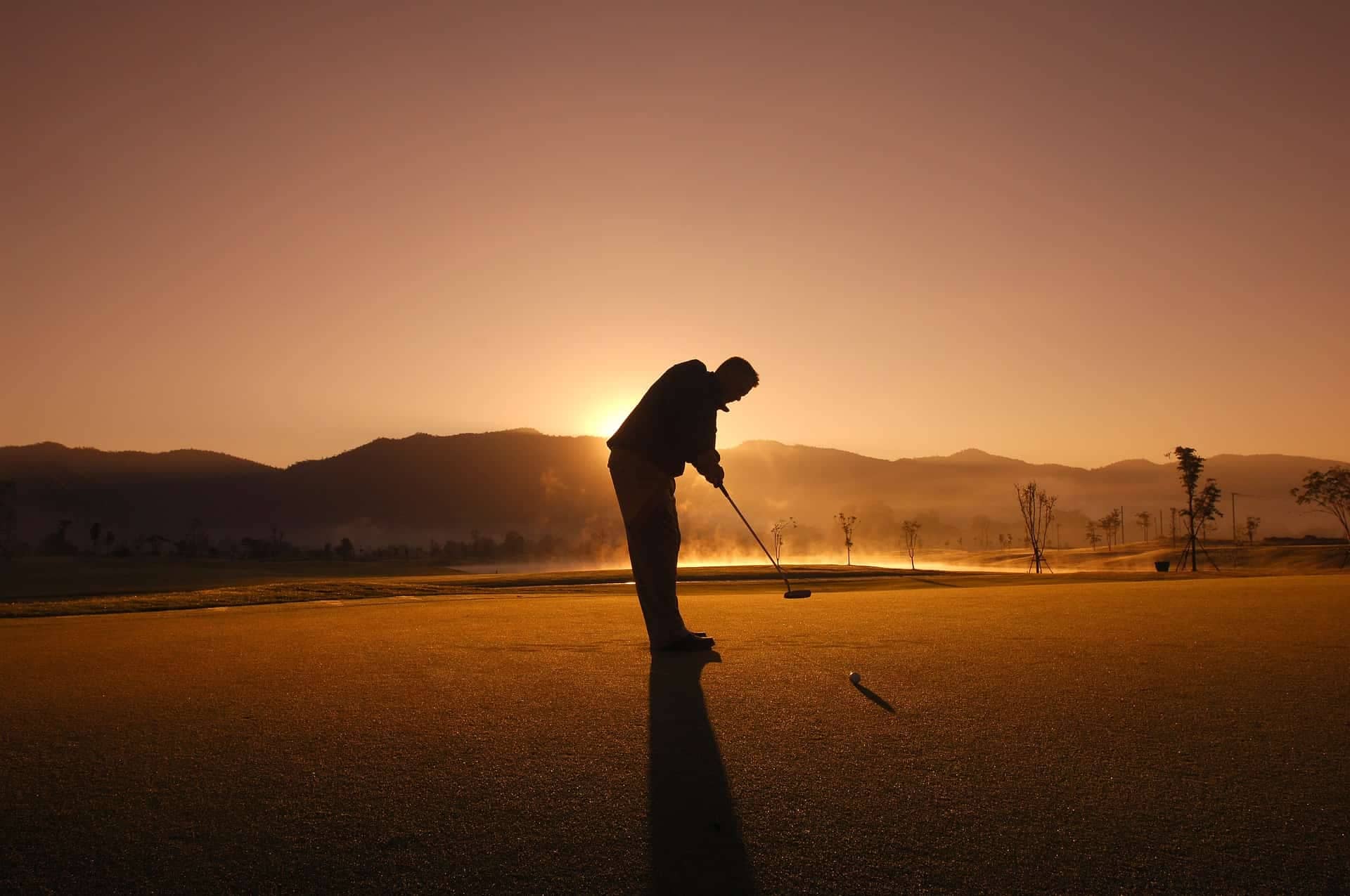 Golfer in the sunset